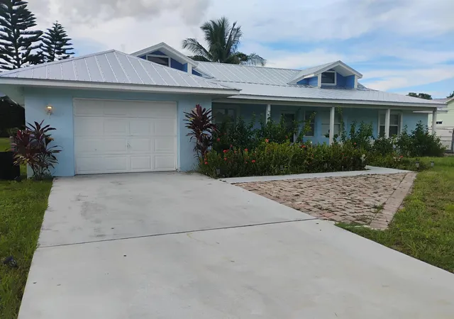 Single family home for sale at 445 SW Cherryhill Rd, Port Saint Lucie, FL 34953 | MLS# R11028238 | Listing updated on 2024-12-03