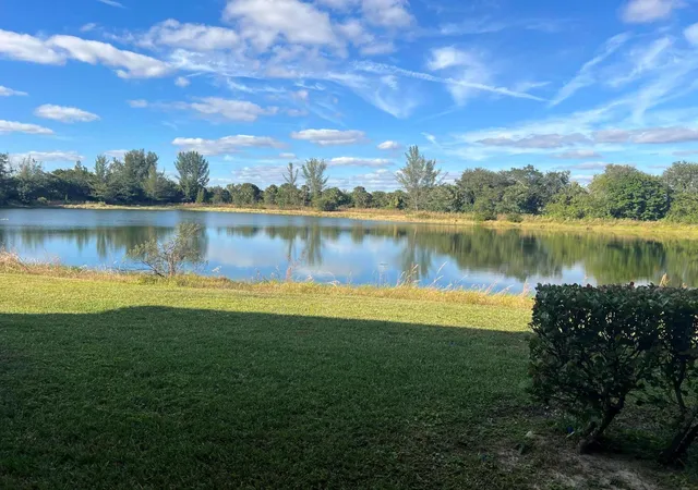 Listing Photo 1 - Condo for sale in building located at 1133 Golden Lakes Blvd, West Palm Beach, FL 33411 - Unit #815