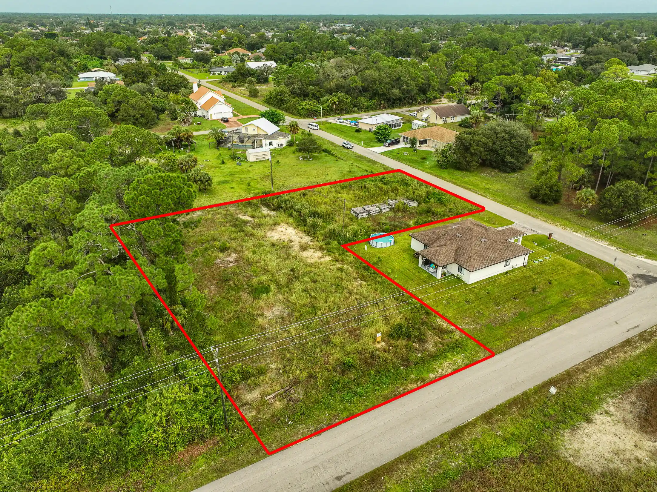 Photo 1 of Land for sale at 21 Mcarthur Ave, Lehigh Acres, FL 33936 | MLS# R11046179 | Listing updated on 2026-10-27