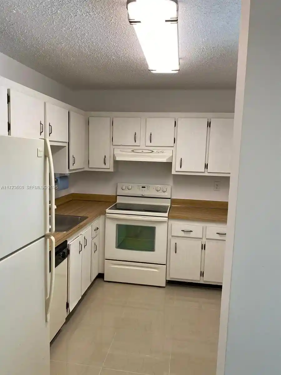 Listing Photo 1 - Condo for sale in 1800 Sw 81St Ave located at 1800 Sw 81St Ave, North Lauderdale, FL 33068 - Unit #1407