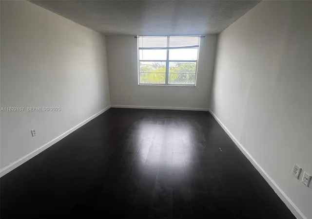 Listing Photo 1 - Condo for sale in building located at 498 Nw 165Th St Rd, Miami, FL 33169 - Unit #D303