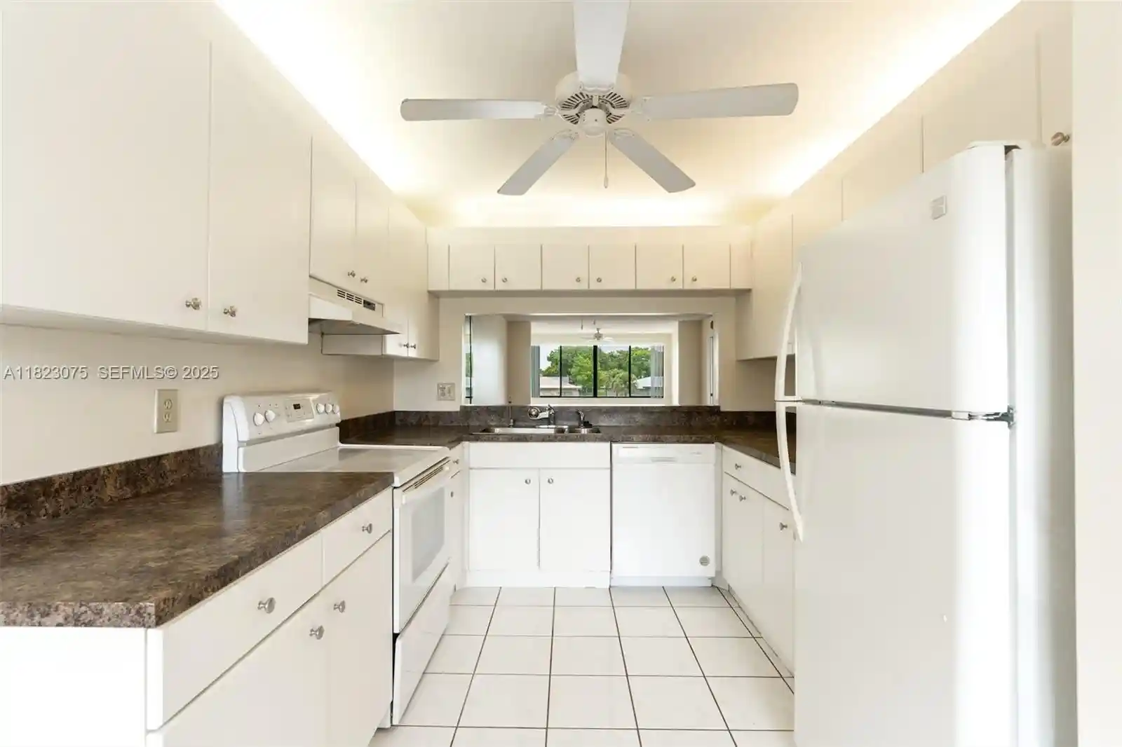 Condo for sale at 9455 N Belfort Cir #211, Tamarac, FL 33321 | MLS# A11823075
