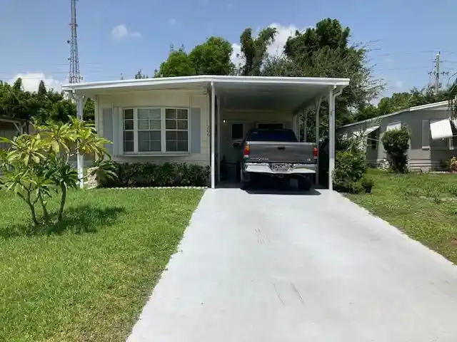 Photo 1 of Manufactured home for sale at 206 W Caribbean, Port Saint Lucie, FL 34952 | MLS# R11111617 | Listing updated on 2026-10-28