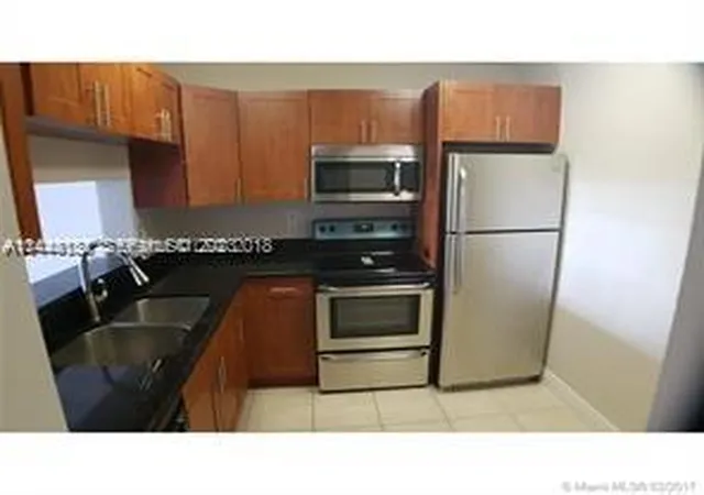 4th image of 496 Nw 165Th St Rd #D112, Miami, FL 33169 | MLS# A11444131
