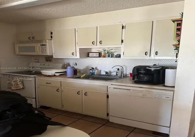 2nd image of 309 S Royal Poinciana Blvd #302, Miami Springs, FL 33166 | MLS# A11845078