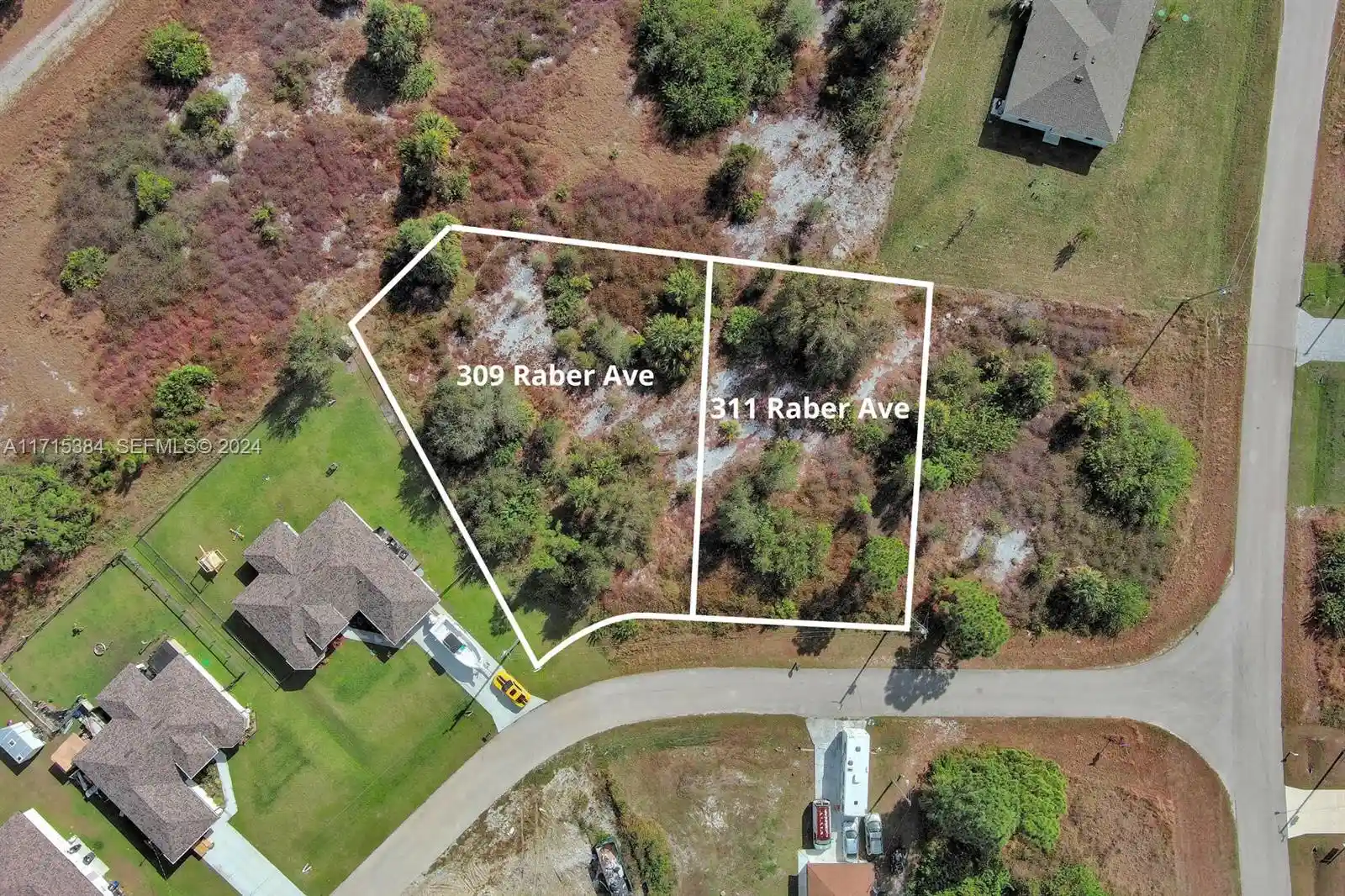Photo 1 of Land for sale at 309 & 311 Raber Ave, Lehigh Acres, FL 33974 | MLS# A11715384 | Listing updated on 2026-05-22