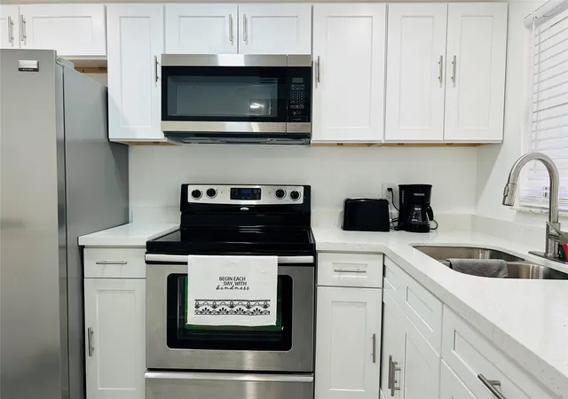 Listing Photo 1 - Condo for sale in building located at 2871 E Sunrise Lakes Dr, Sunrise, FL 33322 - Unit #101