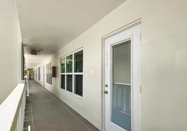 Listing Photo 1 - Condo for sale in building located at 208 Wellington E, West Palm Beach, FL 33417