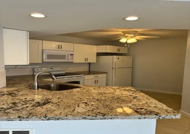 1st image of 8977 Wiles Rd #103, Coral Springs, FL 33067 | MLS# A11889328