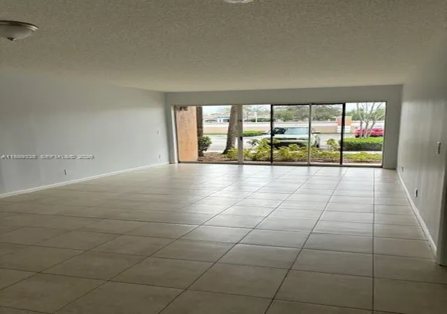 2nd image of 8977 Wiles Rd #103, Coral Springs, FL 33067 | MLS# A11889328