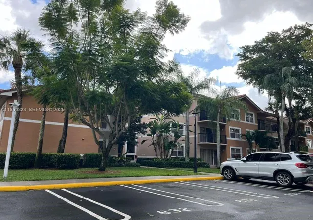 4th image of 8977 Wiles Rd #103, Coral Springs, FL 33067 | MLS# A11889328