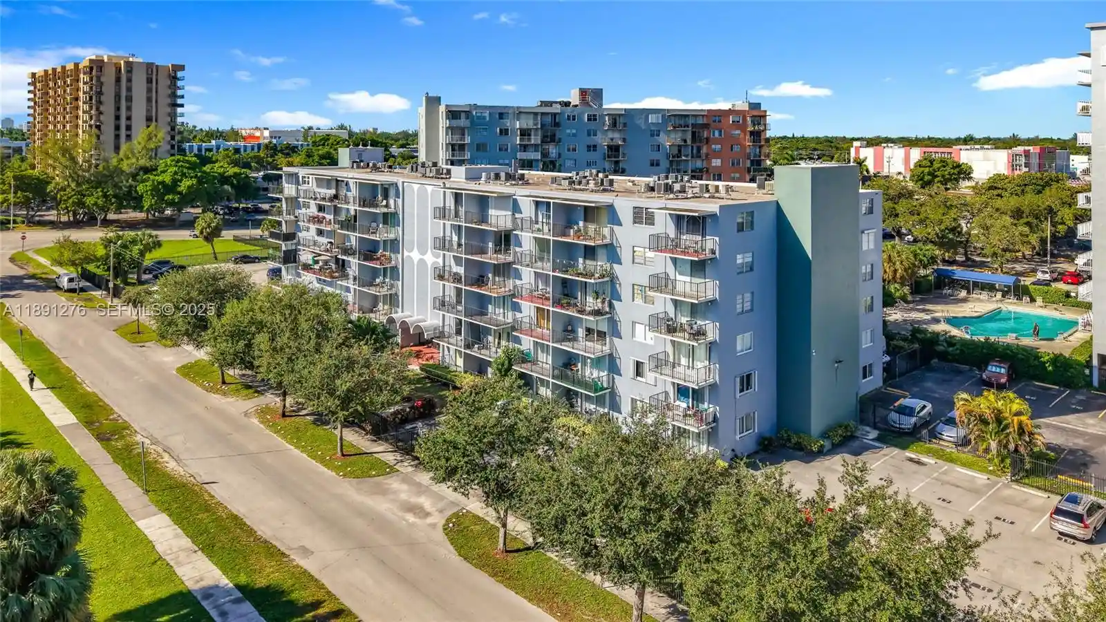 Listing Photo 1 - Condo for sale in 12500 NE 15th Ave located at 12500 NE 15th Ave, North Miami, FL 33161 - Unit #105