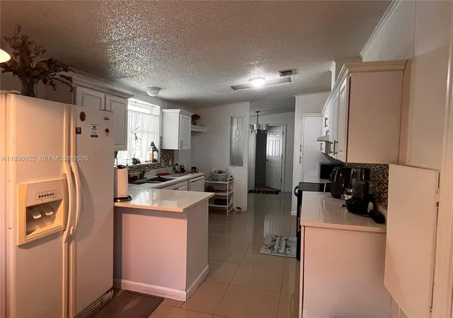 3rd image of 909 Sw 131 Wy, Davie, FL 33325 | MLS# A11890955