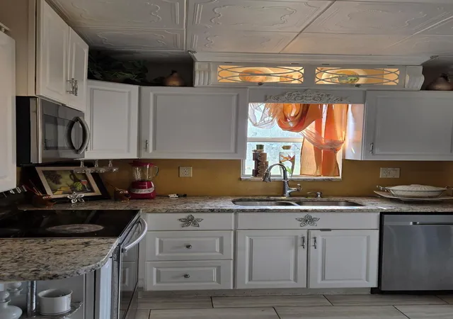 Condo for sale at 3200 NW 5th Terrace #24, Pompano Beach, FL 33064 | MLS# F10532416 | Listing updated on 2025-12-02