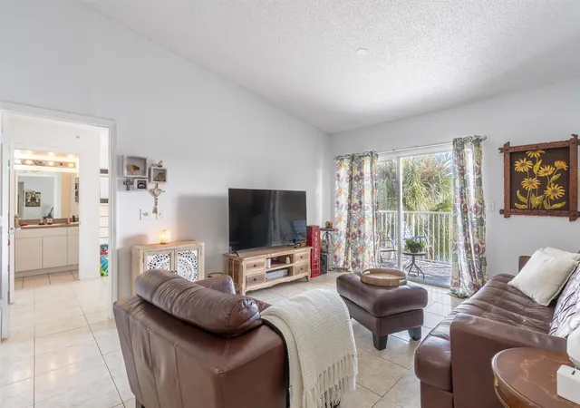Listing Photo 1 - Condo for sale in building located at 5031 Wiles Rd, Coconut Creek, FL 33073 - Unit #304