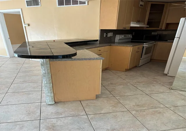 Photo 3 of Condo for sale at 3040 Ne 16th Avenue #A210, Oakland Park, FL 33334 | MLS# F10536878 | Listing updated on 2026-09-23