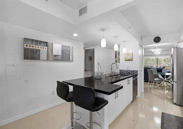 Condo for sale at 900 SW 142nd Avenue #306L, Pembroke Pines, FL 33027 | MLS# A11926294 | Listing updated on 2026-07-07