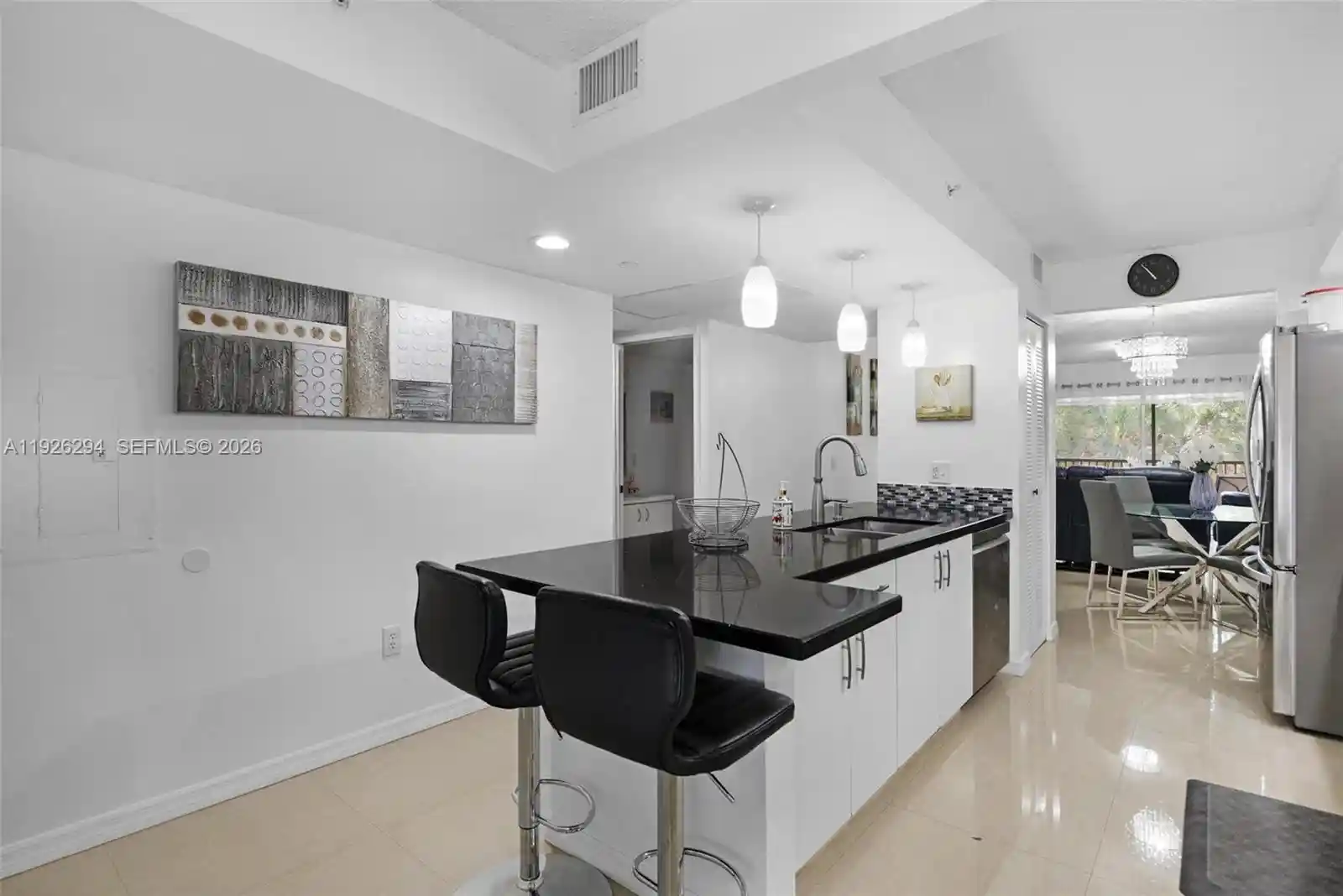 Listing Photo 1 - Condo for sale in 900 Sw 142Nd Ave located at 900 Sw 142Nd Ave, Pembroke Pines, FL 33027 - Unit #306L