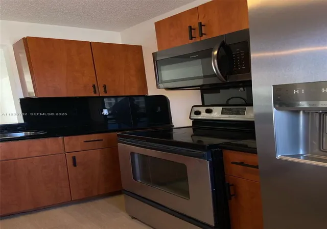 5th image of 8740 N Sherman Cir #305, Miramar, FL 33025 | MLS# A11929732