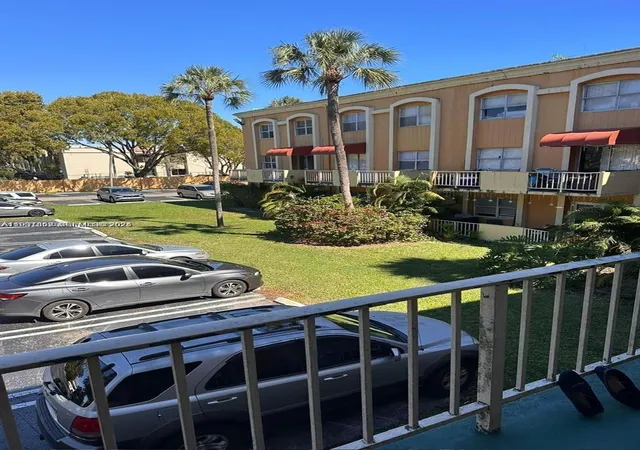 Condo for sale at 18101 NW 68th Avenue #C202, Hialeah, FL 33015 | MLS# A11931359 | Listing updated on 2026-07-07