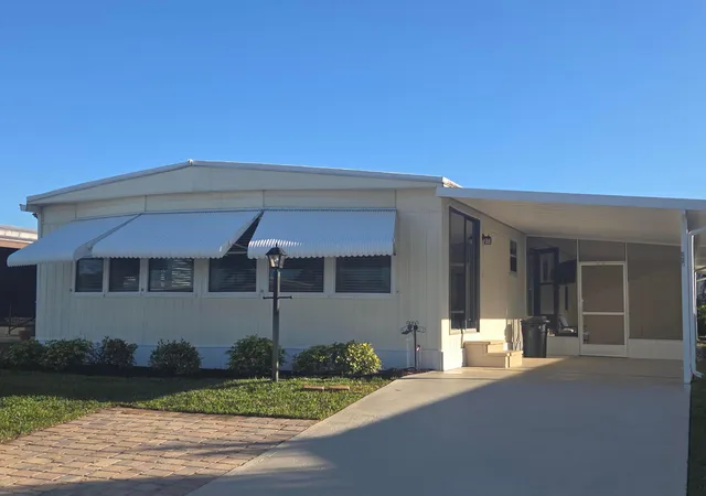 Photo 3 of Manufactured home for sale at 7871 Se Shenandoah Dr, Hobe Sound, FL 33455 | MLS# R11152348 | Listing updated on 2026-09-23
