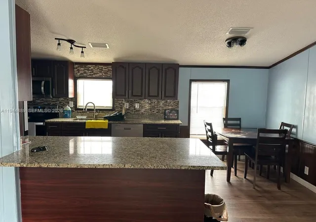 3rd image of 1122 Johnson Rd, Clewiston, FL 33440 | MLS# A11944889