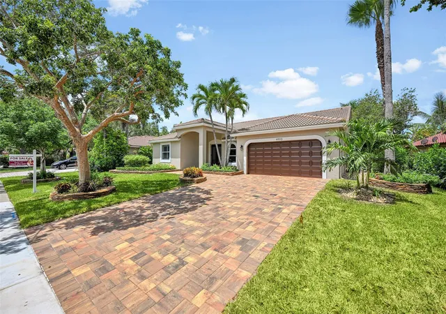 Photo 2 of Single family home for sale at 4910 Nw 104th Avenue, Coral Springs, FL 33076 | MLS# F10546579 | Listing updated on 2026-09-27