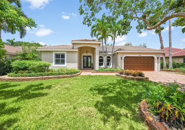 Photo 1 of Single family home for sale at 4910 Nw 104th Avenue, Coral Springs, FL 33076 | MLS# F10546579 | Listing updated on 2026-09-27