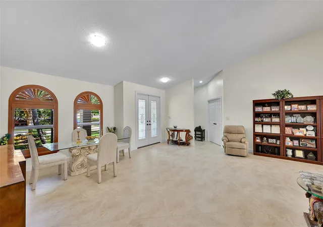 Photo 3 of Single family home for sale at 4910 Nw 104th Avenue, Coral Springs, FL 33076 | MLS# F10546579 | Listing updated on 2026-09-27