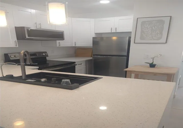 1st image of 600 Layne Blvd #122, Hallandale Beach, FL 33009 | MLS# A11945865