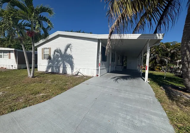 Photo 1 of Sale Pending at 403 Nw 50th Ct Lot# 1415, Deerfield Beach, FL 33064 | MLS# R11158917 | Listing updated on 2026-10-02