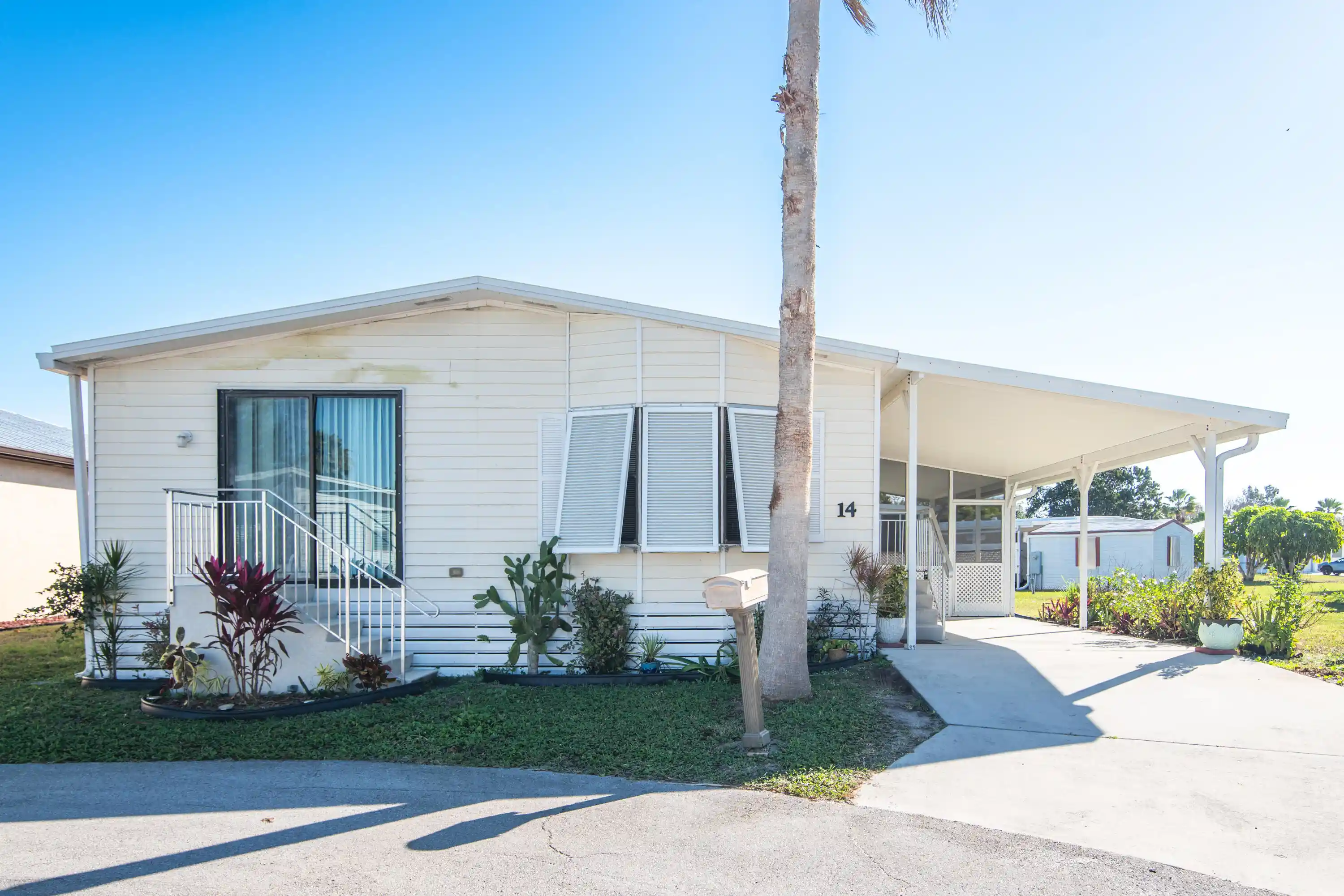 Photo 1 of Manufactured home for sale at 14 Jacaranda Ln, Port Saint Lucie, FL 34952 | MLS# R11159077 | Listing updated on 2026-10-23
