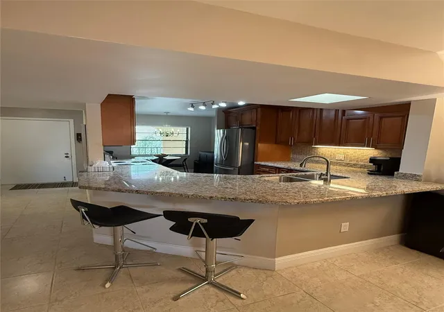 Photo 1 of Condo for sale at 23380 Carolwood Ln #408, Boca Raton, FL 33428 | MLS# F10550598 | Listing updated on 2026-10-10