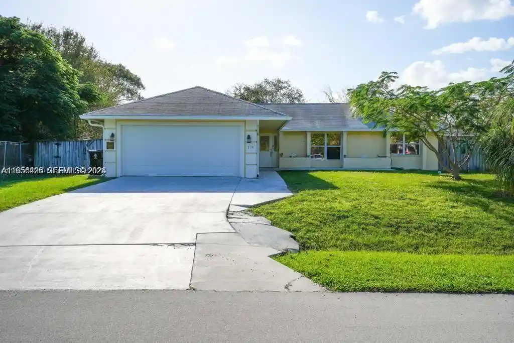 Photo 1 of Single family home for sale at 714 Ne Lanfair St, Port Saint Lucie, FL 34983 | MLS# A11956426 | Listing updated on 2026-10-19