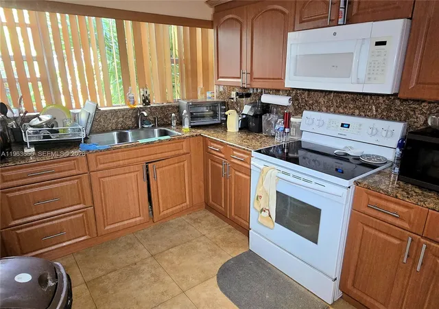 Homes for sale in Miami, FL | 940 Ne 199Th St, Miami, FL 33179