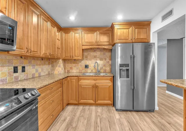 3rd image of 6201 N Falls Cir Dr #210, Lauderhill, FL 33319 | MLS# A11965364