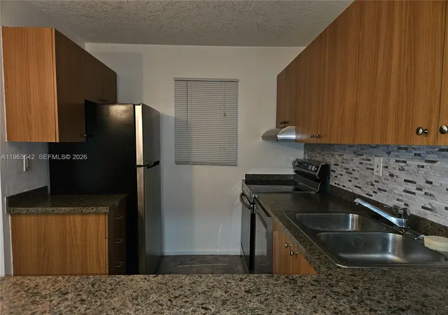 5th image of 7610 Stirling Rd #102C, Davie, FL 33024 | MLS# A11965642