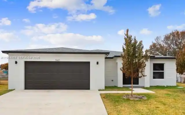 Photo 1 of Single family home for sale at 560 Sw Carter Ave, Port Saint Lucie, FL 34983 | MLS# A11964358 | Listing updated on 2026-09-23