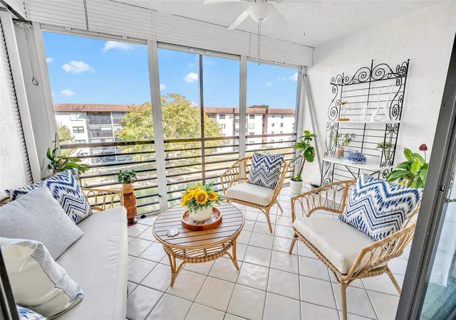 Photo 2 of Condo for sale at 4975 E Sabal Palm Blvd #408, Tamarac, FL 33319 | MLS# F10552507 | Listing updated on 2026-10-06