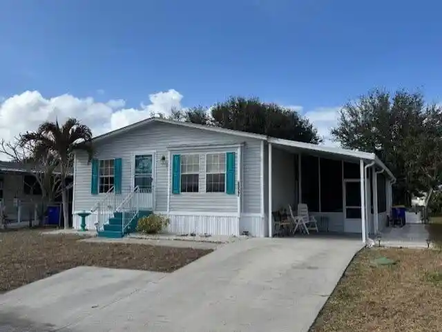 Manufactured home for sale at 6927 SE Delegate St, Hobe Sound, FL 33455 | MLS# R11164573