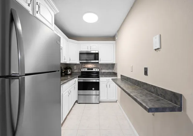 Listing Photo 3 - Condo for sale in building located at 5180 E Sabal Palm Blvd, Tamarac, FL 33319 - Unit #239