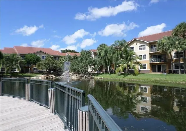 1st image of 8781 Wiles Rd #203, Coral Springs, FL 33067 | MLS# R11165118
