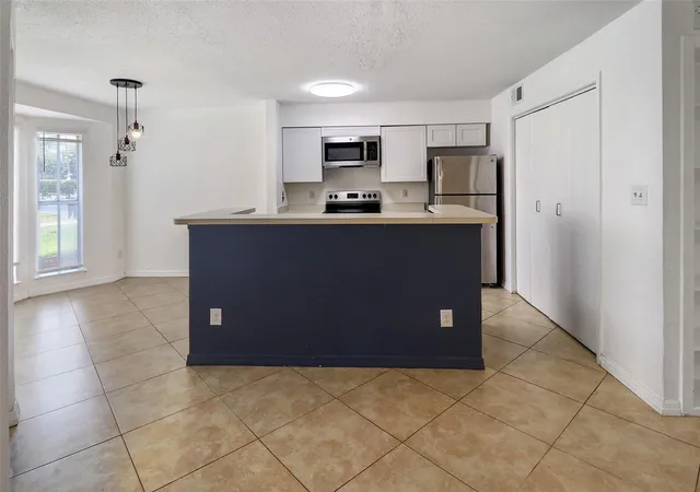 Photo 1 of Condo for sale at 777 Riverside Dr #1516, Coral Springs, FL 33071 | MLS# F10554370 | Listing updated on 2026-09-23