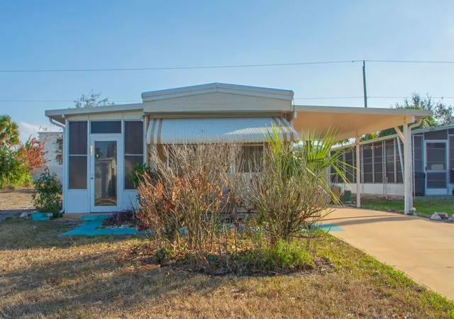 Photo 2 of Manufactured home for sale at 335 Ne Tropicalia Ln, Jensen Beach, FL 34957 | MLS# R11167408 | Listing updated on 2026-09-23