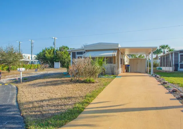 Photo 3 of Manufactured home for sale at 335 NE Tropicalia Ln, Jensen Beach, FL 34957 | MLS# R11167408 | Listing updated on 2026-09-23