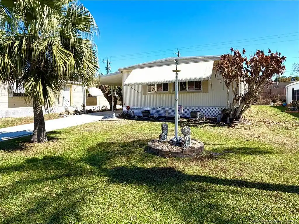 Photo 1 of Manufactured home for sale at 6 Santa Cruz Way, Port Saint Lucie, FL 34952 | MLS# M20054551 | Listing updated on 2026-10-12