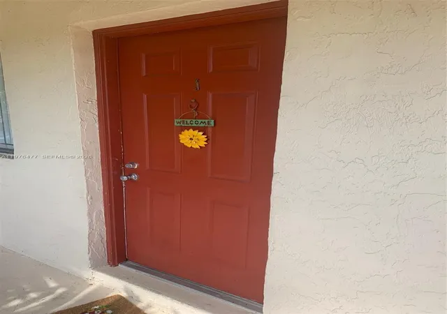 4th image of 300 Nottingham Cir, Greenacres, FL 33463