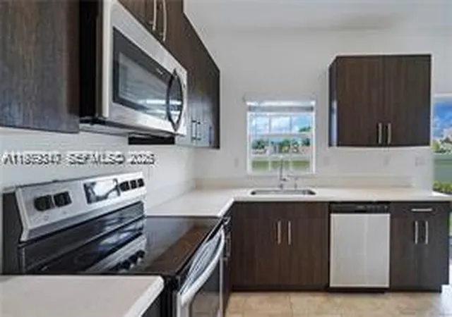 4th image of 1121 Nw 41St Ln, Lauderhill, FL 33313 | MLS# A11979317