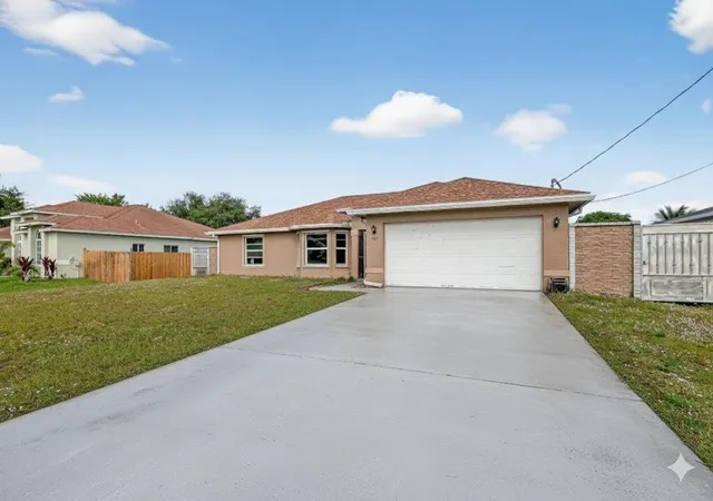 Homes for sale in Port Saint Lucie, FL | 557 Sw Halkell Ave, Port Saint Lucie, FL 34953 | MLS# B26000052