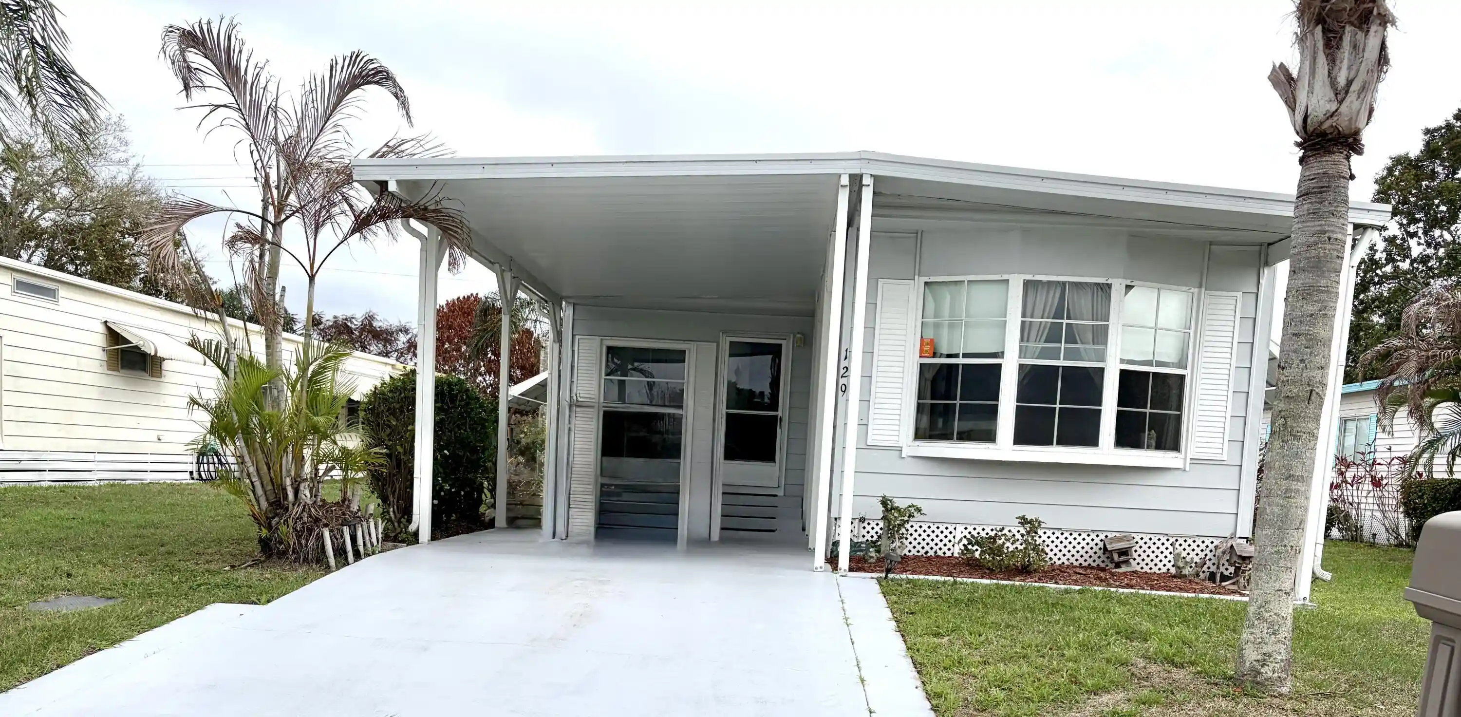 Photo 1 of Manufactured home for sale at 129 E Caribbean, Port Saint Lucie, FL 34952 | MLS# B26002091 | Listing updated on 2026-09-24